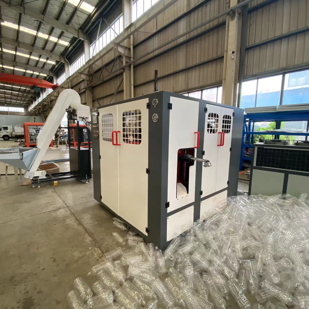 Full Automatic Servo Type PET Stretch Blow Molding Machine Plastic Container machines and molds Manufacturing