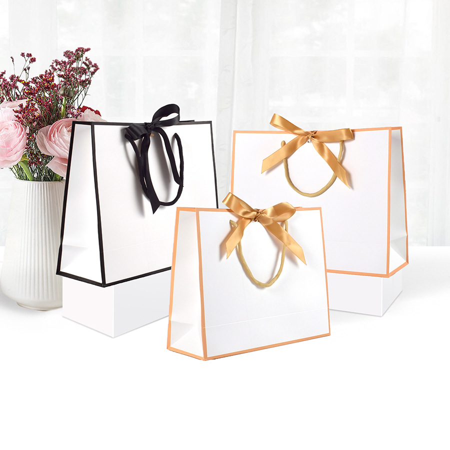 Wholesale Cosmetics Shoes Clothing shopping gift paper bag package Ribbon bow square bottom paper bag with bow