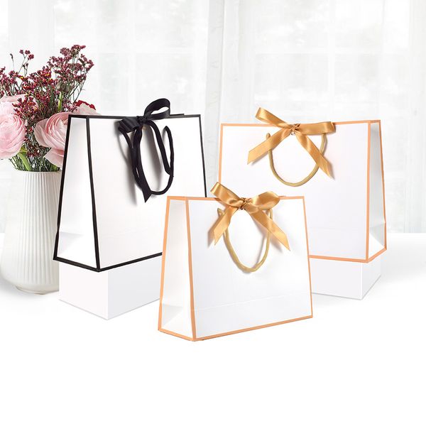 Wholesale Cosmetics Shoes Clothing shopping gift paper bag package Ribbon bow square bottom paper bag with bow