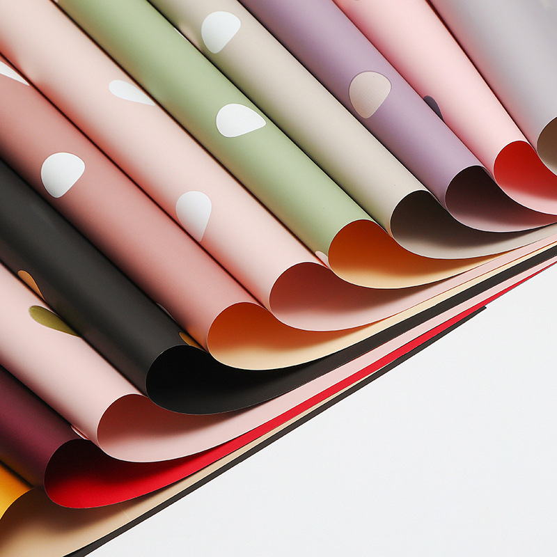 Wenzhou Aquatic International Trade Co., Ltd. Hot Selling High Quality Dot Design Waterproof Plastic Flower Wrapping Paper