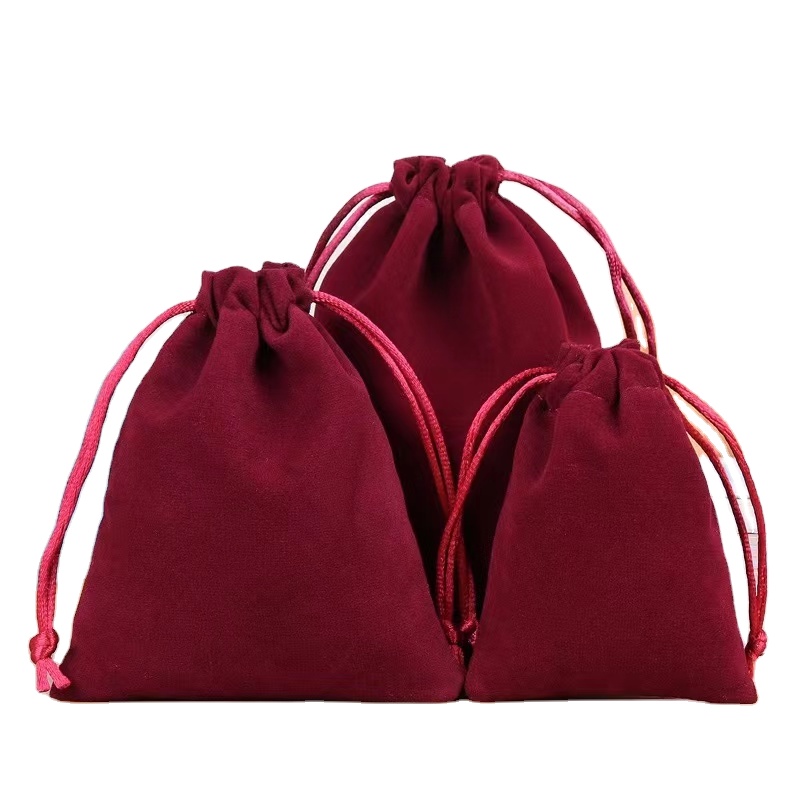 Shenzhen Huahongchang Packaging Products Co., Ltd. Source factory customized velvet cloth bag, logo pull rope bag can be designed, wholesale Christmas gift packaging bag