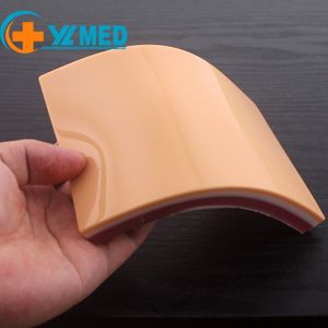 Medical students use injection training surgical suturing exercise simulate skin pads layered silicone material skin