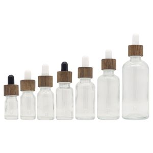 Clear glass bamboo bottles 5ml 10ml 15ml 20ml 30ml 50ml 100ml glass essential oil bottles with brown dark wood bamboo dropper