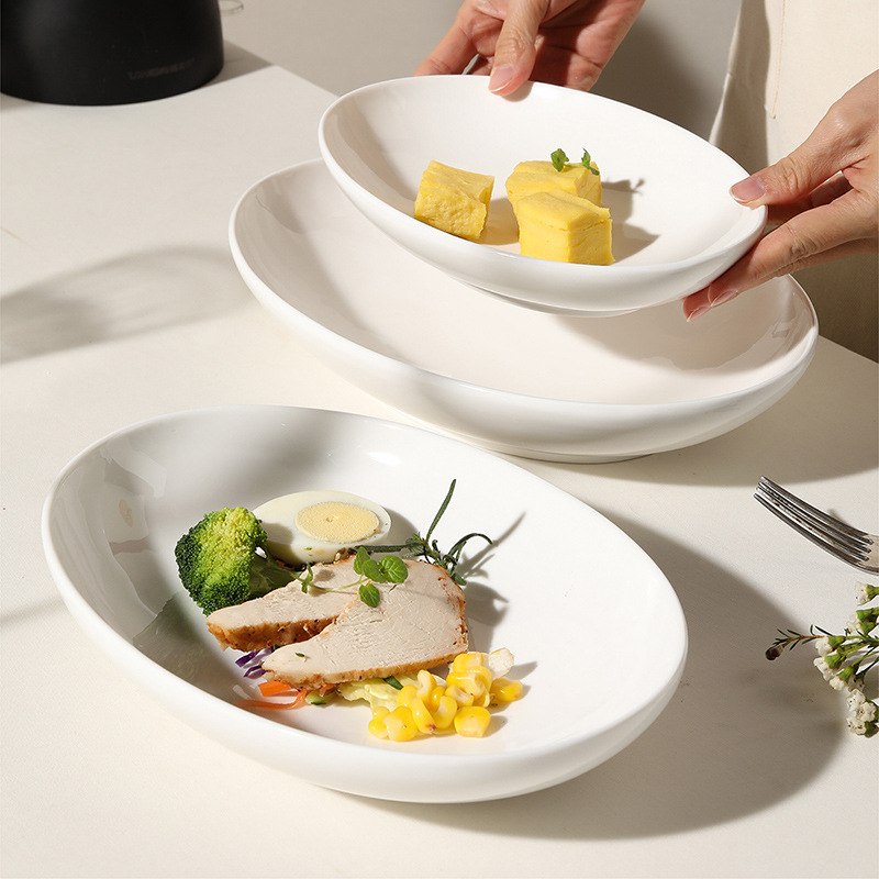 Yiwu Zhuotong Electronic Technology Co., Ltd. Ins style Nordic pure white ceramic oval dish fruit snacks plate for restaurant and hotel