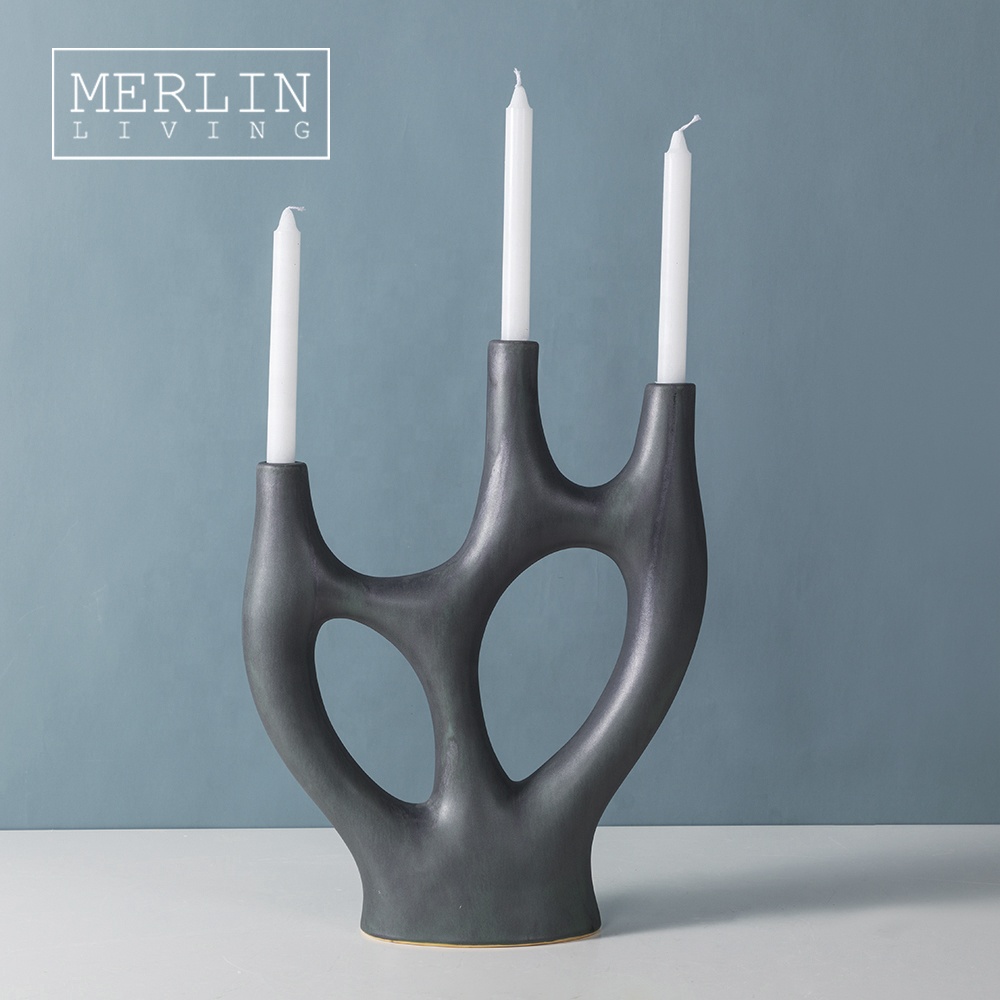 Shenzhen Merlin Living Decorated Word Co., Ltd. Merlin luxury novel smooth glaze matte stick holders tea light candlestick home decor with ceramic candle holders