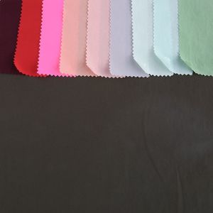 2024 New fashion plain woven jersey fabric 88%POLIAMMIDE 12%ELASTAN recycled nylon span woven fabric for garments