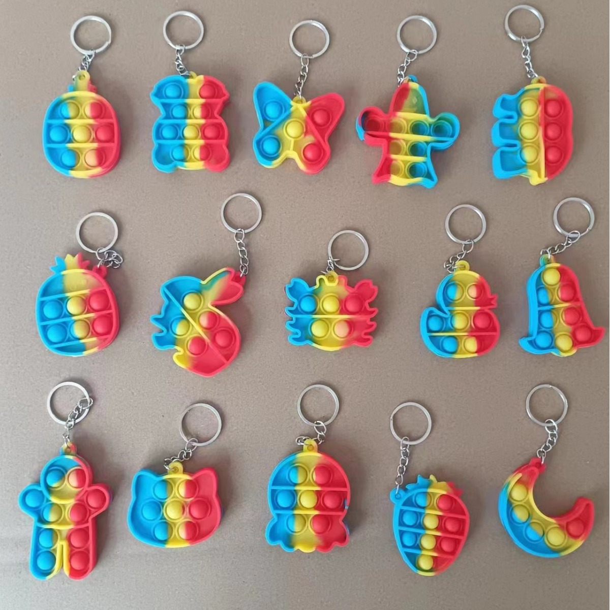 2024 New Hot Selling Mixed Animal Fruits Color Silicone Decompression Press Key Pendant Bag Keychain Pendant Car Key Chain