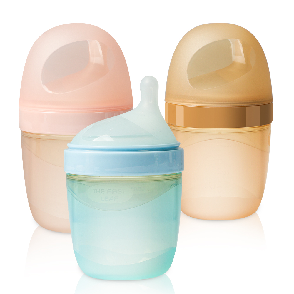 Newsun Silicone Products Co., Ltd New Arrival Anti fall eco Friendly BPA free Baby Bottle Wide Neck Silicone Feeding Bottle for Weaning