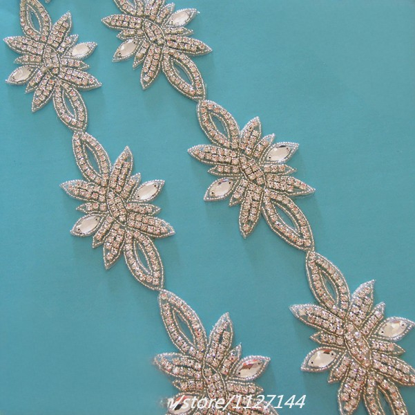 Guangzhou Sumanduo Crafts Co., Ltd. (10 YARDS )Wholesale beaded bridal crystal glass silver rhinestone applique trim iron on for wedding dress sash IRON ON WDD0443