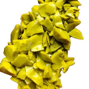 Dark color opaque Yellow crushed glass chips and cullet stone or aggregate for premium terrazzo flooring work bulk used