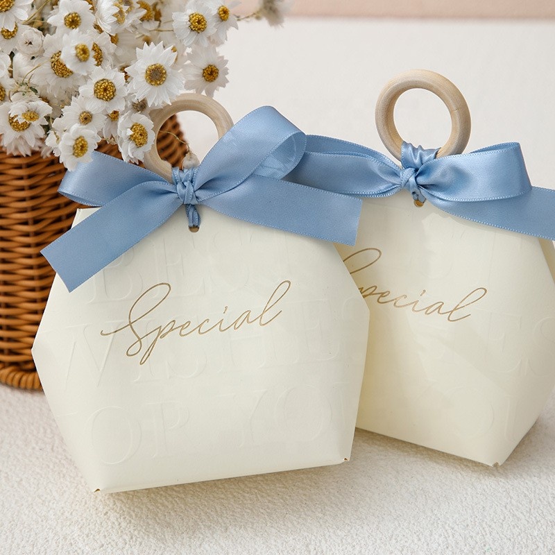 Yangjiang City Yangdong District Gongxin Plastic Products Factory Creative champagne color ribbon wooden ring wedding gift box candy packaging bag