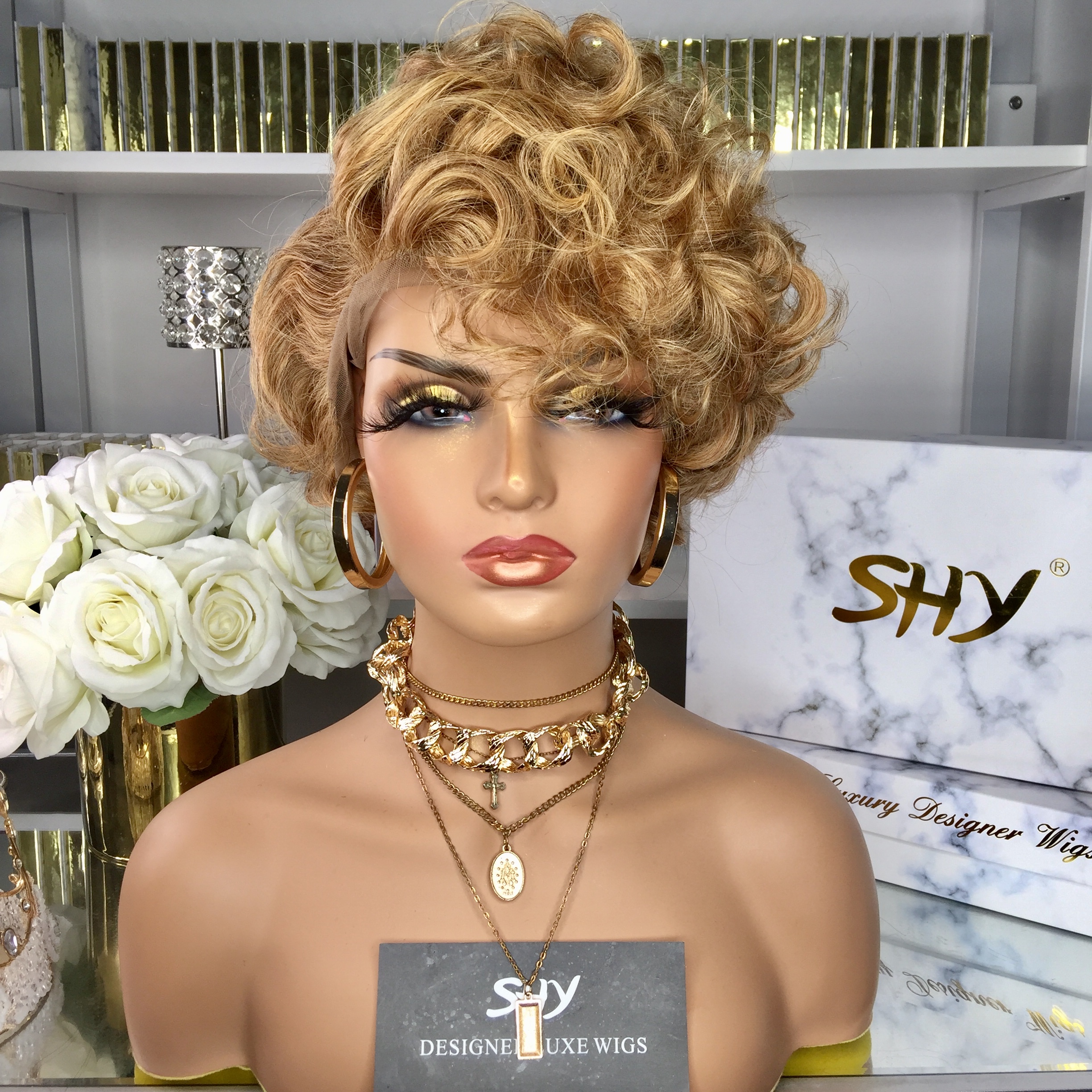 Qingdao Songhuiyuan Trading Co., Ltd. Shy Hair Hot Selling 150% Density 10inch #27 Color Pixie Cut Human Hair Lace Front Wigs With Natural Hairline Baby Hair