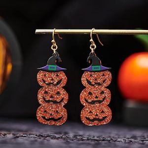 Three cheerful orange pumpkin acrylic pendant earrings