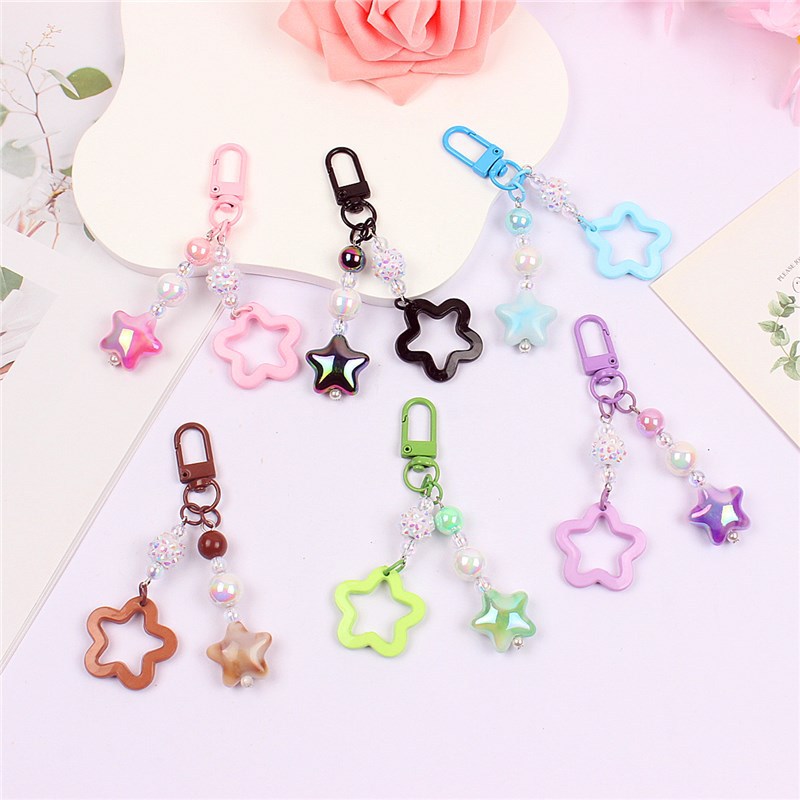 Changsha Mijia Trading Co., Ltd. Factory direct creative new ins plating AB colorful pentagram diamond ball keychain student bag keychain keychains key chains