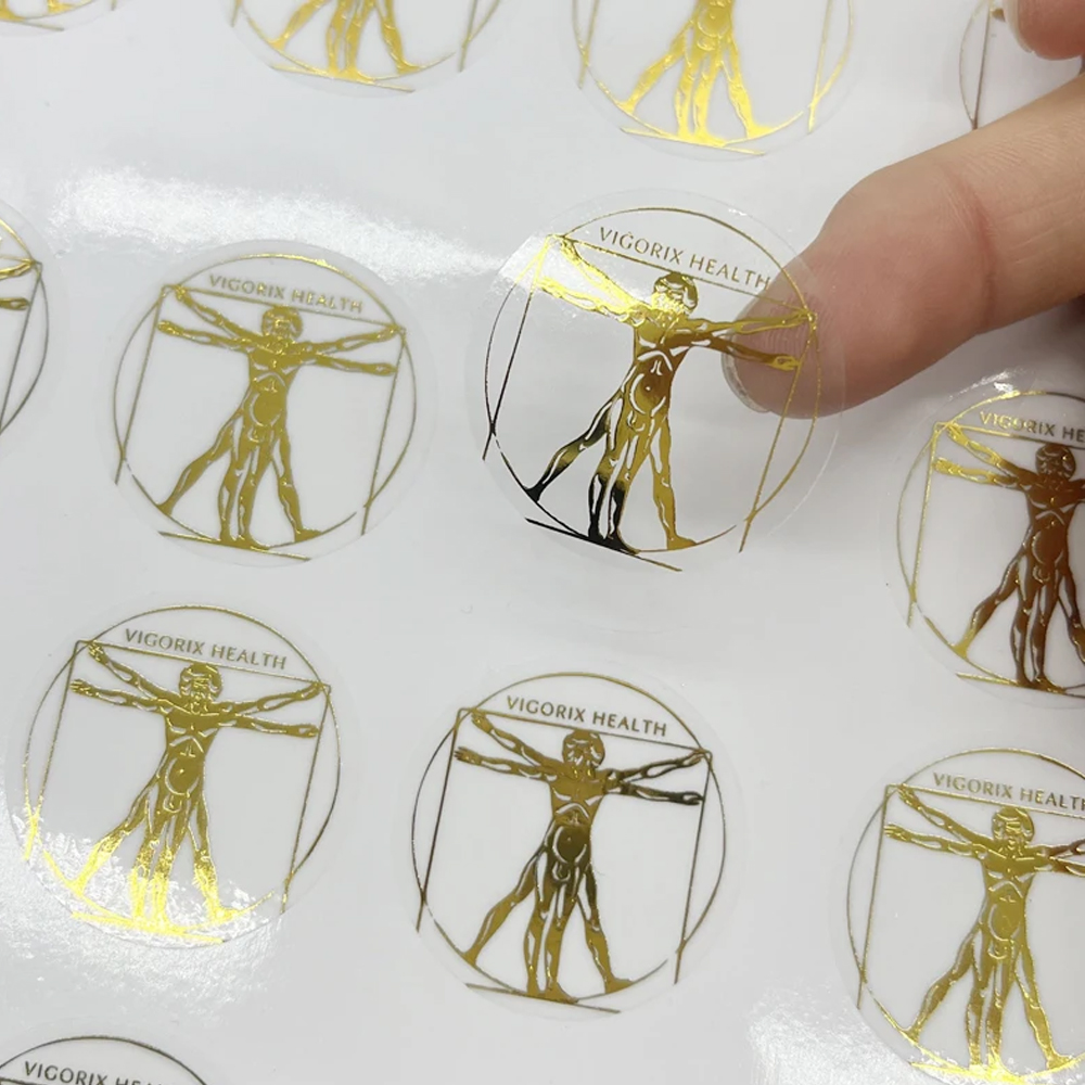Guangzhou Dingli Packaging Products Co., Ltd. custom printing hot stamping gold foil clear sticker vinyl waterproof label green transparent sticker For Bottles