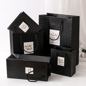 China Factory Luxury Paper Bag Creative Corrugated Board Jewelry Packaging Customizable Shape with Gold Foil Embossing Candles