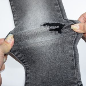 Tr 3/1 Right Twill Stretch Denim Fabric for Jean with Slub Yarn