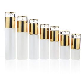 Wholesale Luxury skin care white cosmetic glass lotion bottle and glass cream jar with gold cap