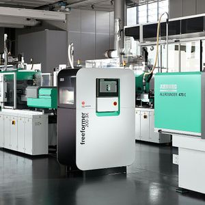 injection molding machines, additive manufacturing solutions, and robotic systems