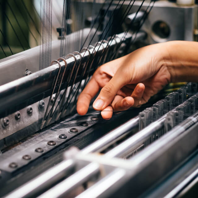 Zamak components for textile machinery