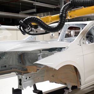 INSTALLATION OF A ROBOTIZED CELL FOR THE MEASUREMENT OF PAINT