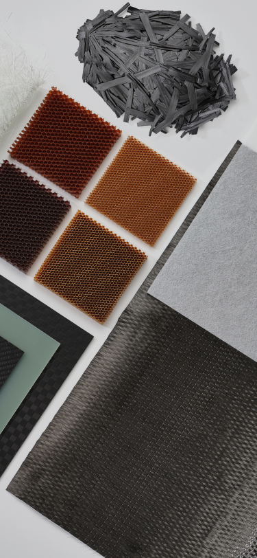 carbon fiber, glass fiber fabrics, and aramid fabrics