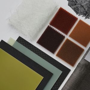 carbon fiber, glass fiber fabrics, and aramid fabrics