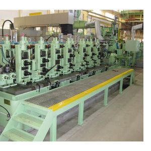 Cold roll forming machines and tube mills