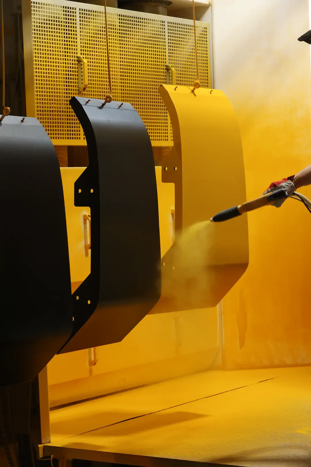 Fenders and other metal parts for front loaders of Volvo Construction Equipment.