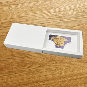 Paper card and related packaging