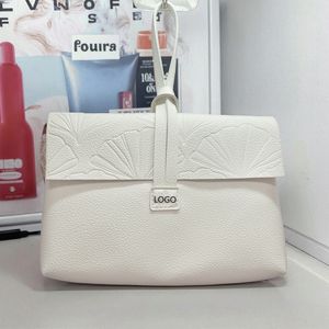 White Vegan Leather Makeup Bag Debossed Custom Logo OEM Promotional Wristlet Beauty Pouch Water-resistance PU Small Cosmetic Bag