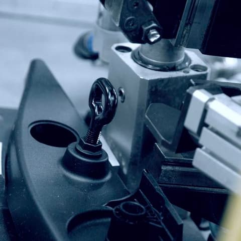 Thermoplastic Automotive Component with Tow Hook Attachment