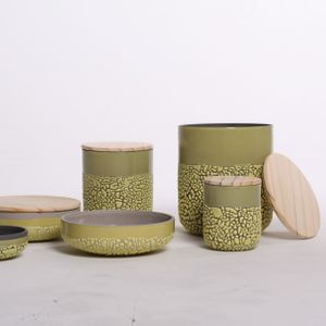 Ceramic containers and bowls with textured glaze and wooden lids