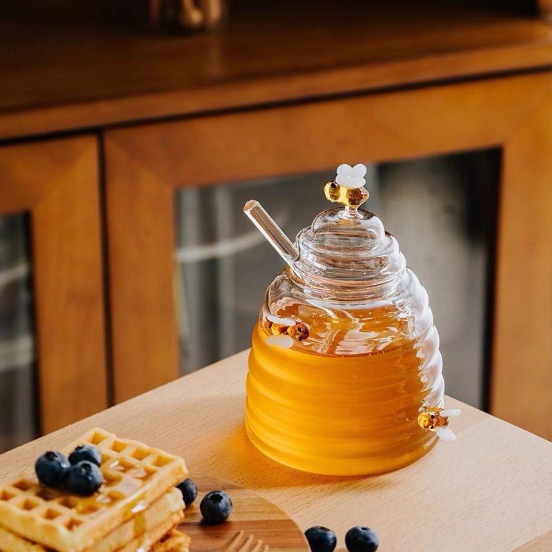 Hejian Zhongxu Glass Products Co., Ltd. Clear Minimalist Kitchen Polylactic Acid Honey Jar Pot with Dipper Dustproof Lid Funnel...