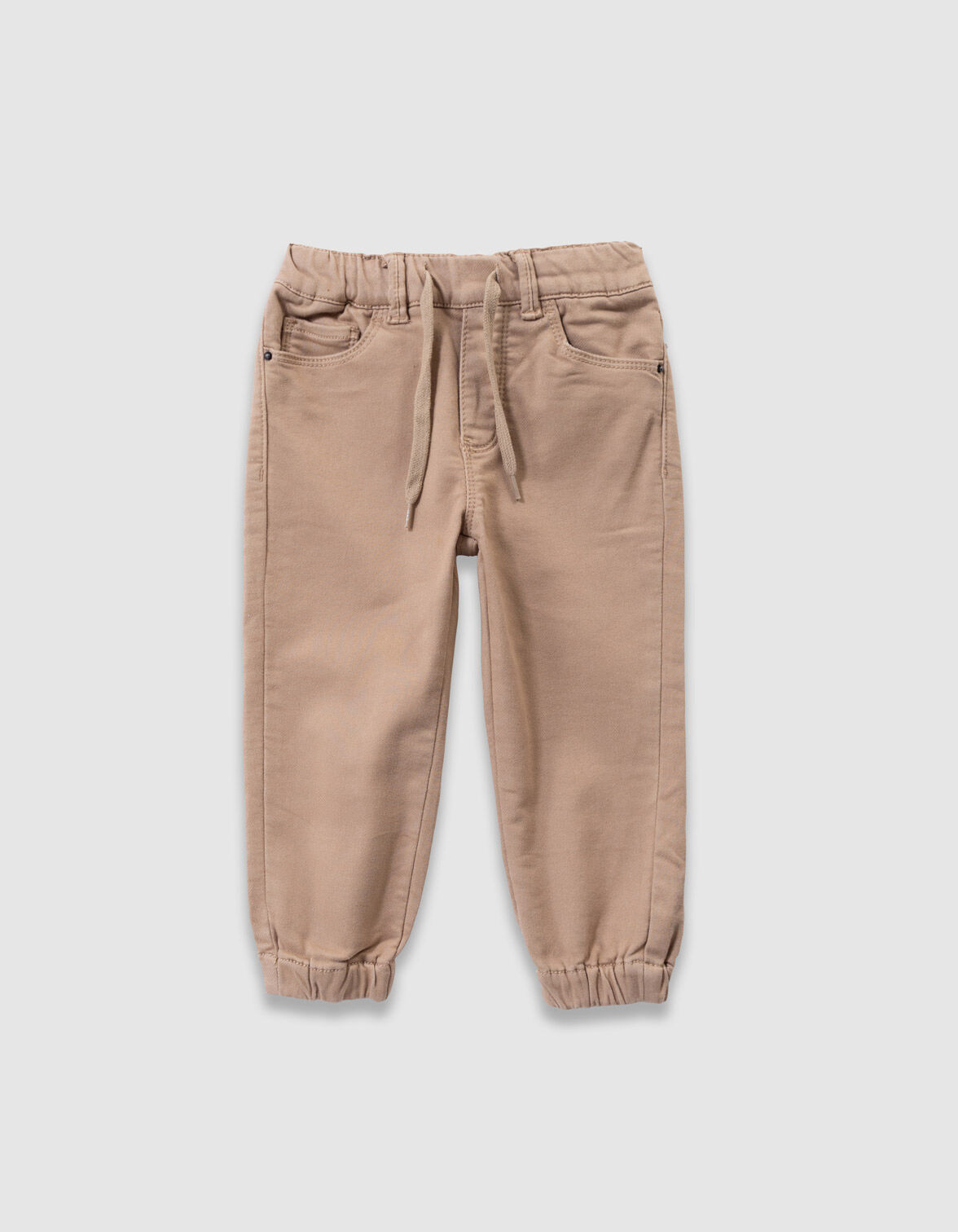 Jean loose beige taille élastiquée garçon