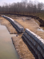 GEOCONTAINERS FILLED WITH LOCAL MATERIAL