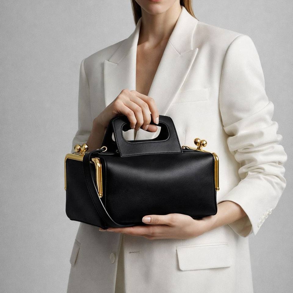 Guangzhou Xixi Leather Goods Co., Ltd. Retro Two-sided Pinch Design Pillow Bag 2026 Summer New Women's Handbag Shoulder...
