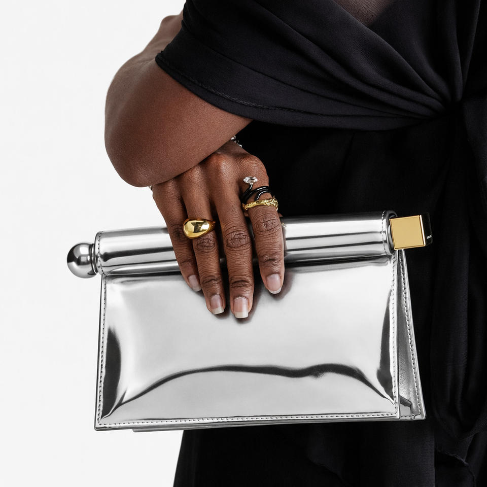 Guangzhou Xixi Leather Goods Co., Ltd. Factory Direct 2025 French Niche Rolled Edge Clutch Women Versatile Chain Handheld...