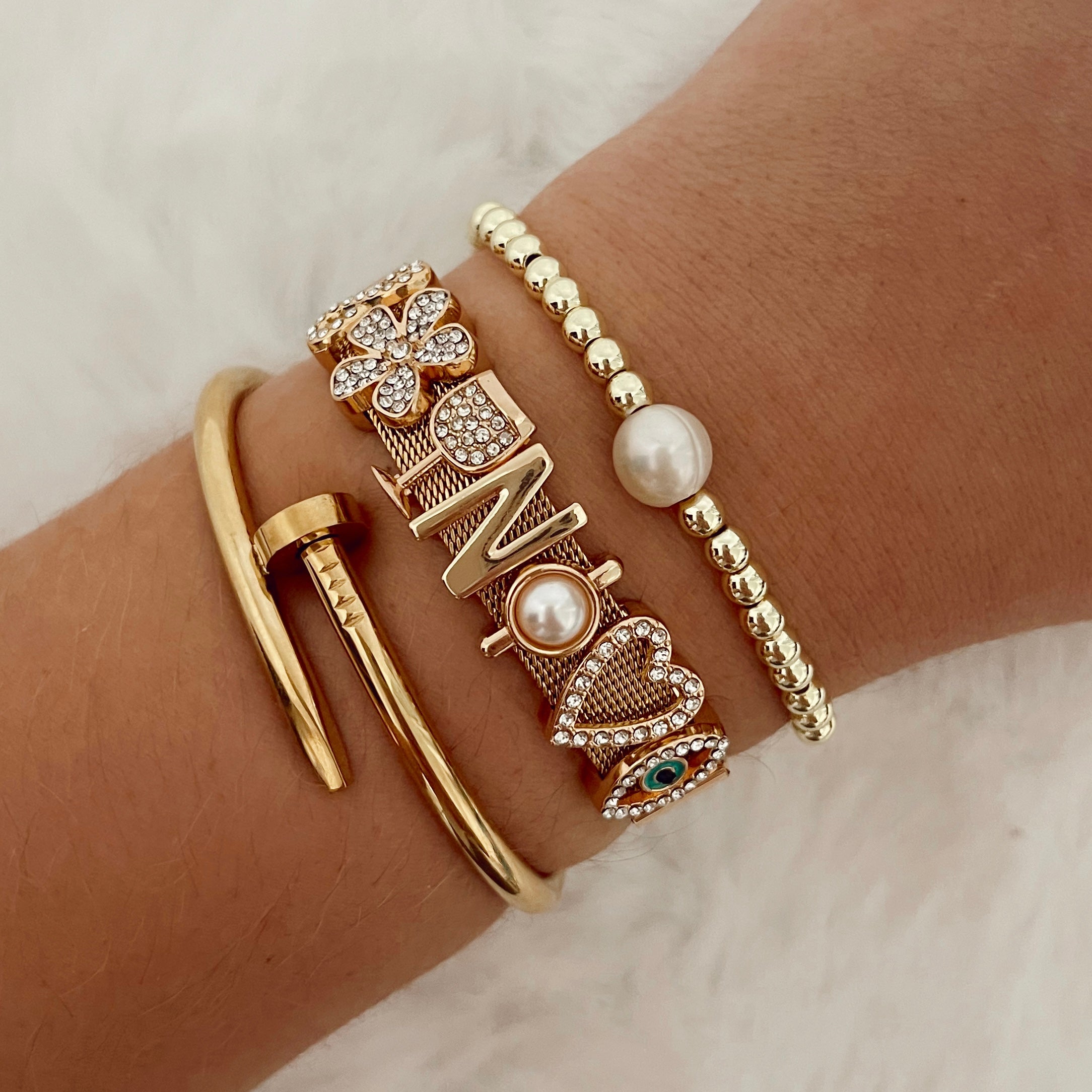 Cara O Sello Brand Gold & Rose Charms