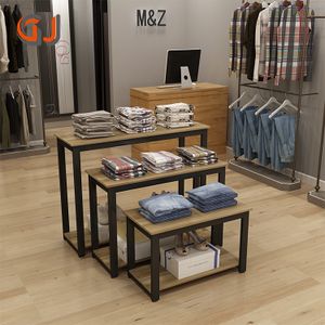 High-End Retail Display Design for Clothing Stores Nesting Table Interior Clothing Rack Shelving Stand for Shop Fitting