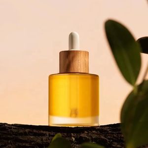 Hot Sale Recyclable Cosmetic Transparent Flat Shoulder Essential Oil Round Glass Dropper Bottle 50ml