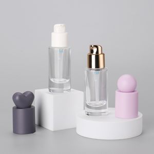 Clear Glass Pump Head Cosmetic Bottle Empty Liquid Cream Foundation Glass Bottles With Heart Ball Shape Cap