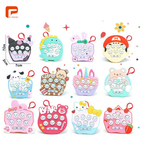 Hot sale Cartoon mini handheld children's Whack-a-mole light up game keychain puzzle decompression toy press music pendant.