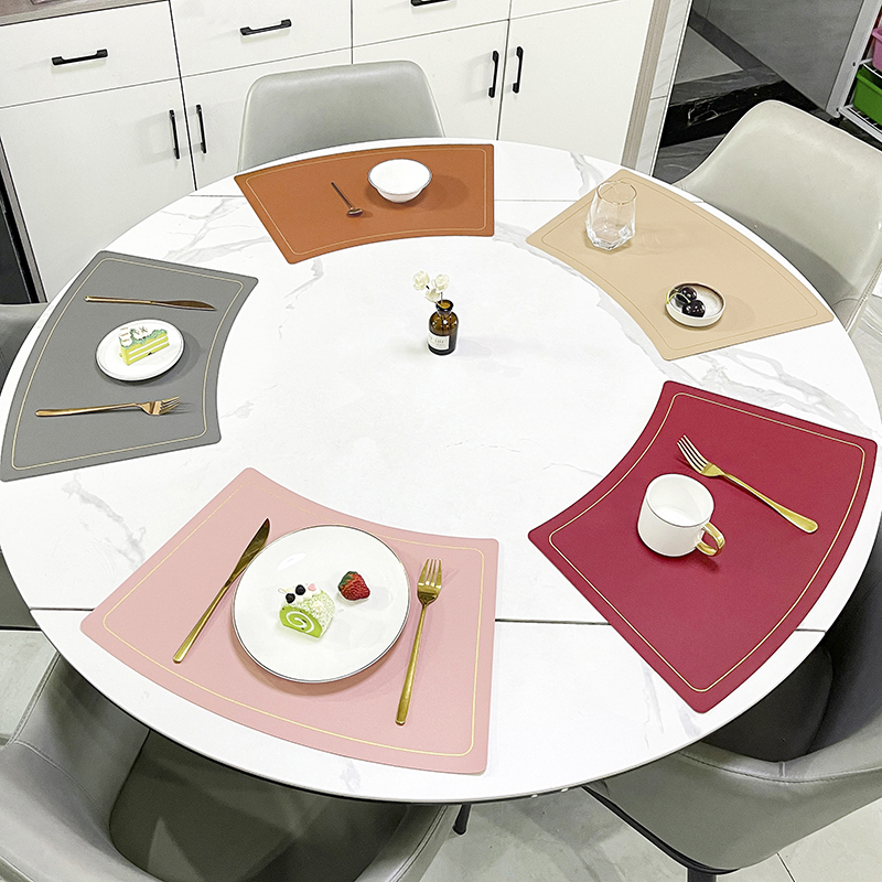Guangzhou Xinshang Leather Technology Co., Ltd. High quality luxury round dining table leather Scallop shaped placemat for hotel cafe home desktop decoration table mat