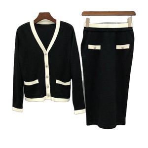 Long Sleeve Solid Suit Drop Shoulder o Neck cardigan Pocket Front Female Two Piece Set Women Sweater Knitted Skirt Set