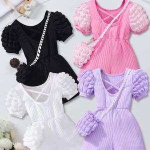 Children crossover romper with puffed sleeves and striped back includes bag