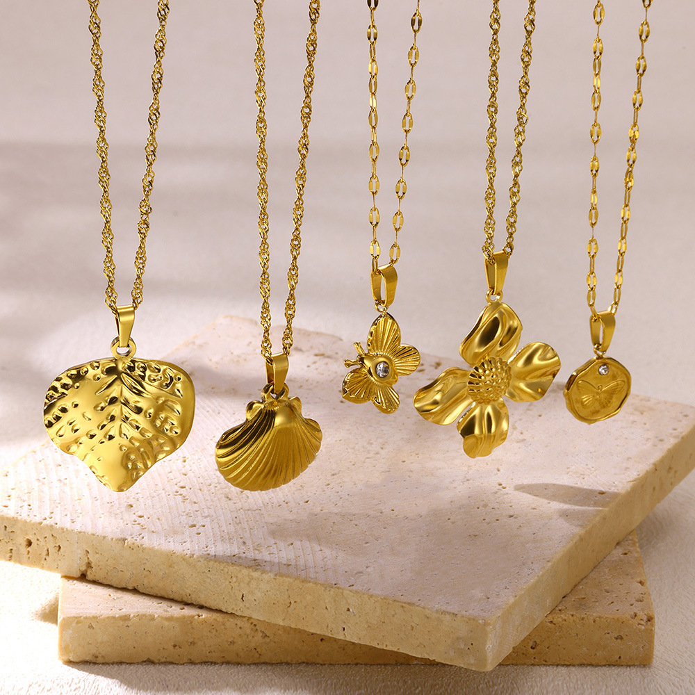Changsha Mijia Trading Co., Ltd. Europe the United States niche INS wind fashion18K gold stainless steel heart texture butterfly pendant female shell necklaces