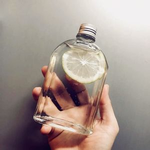Factory Customizable 200ml 250ml 350ml 500ml  Home Shape Transparent Refill Glass Bottle For Beverages Liquor With Metal Lid