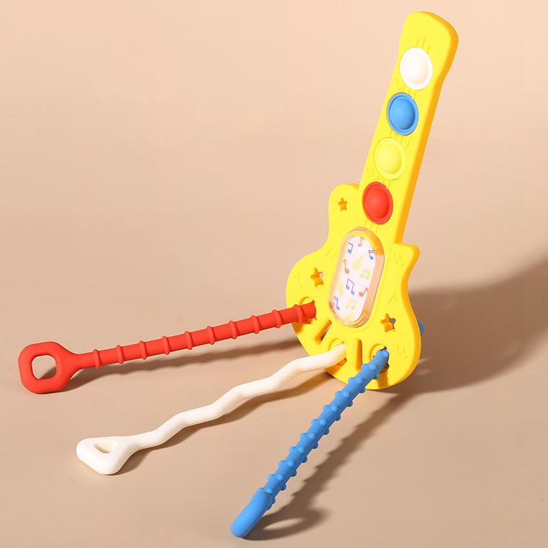 Shenzhen Kean Silicone Product Co., Ltd. Baby Teething Pull String Toy Guitar Sensory Educational Development Toys 2024 Montessori Toys For Children