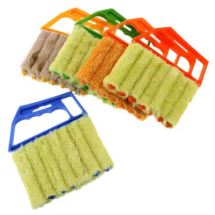 Cixi Ebridge Imp. & Exp. Co., Ltd. Multifunctional Cleaning Brush for Removing Dust from Gaps of Household Curtains, shutters and air conditioning fans.